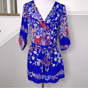 Vibrant blue floral romper